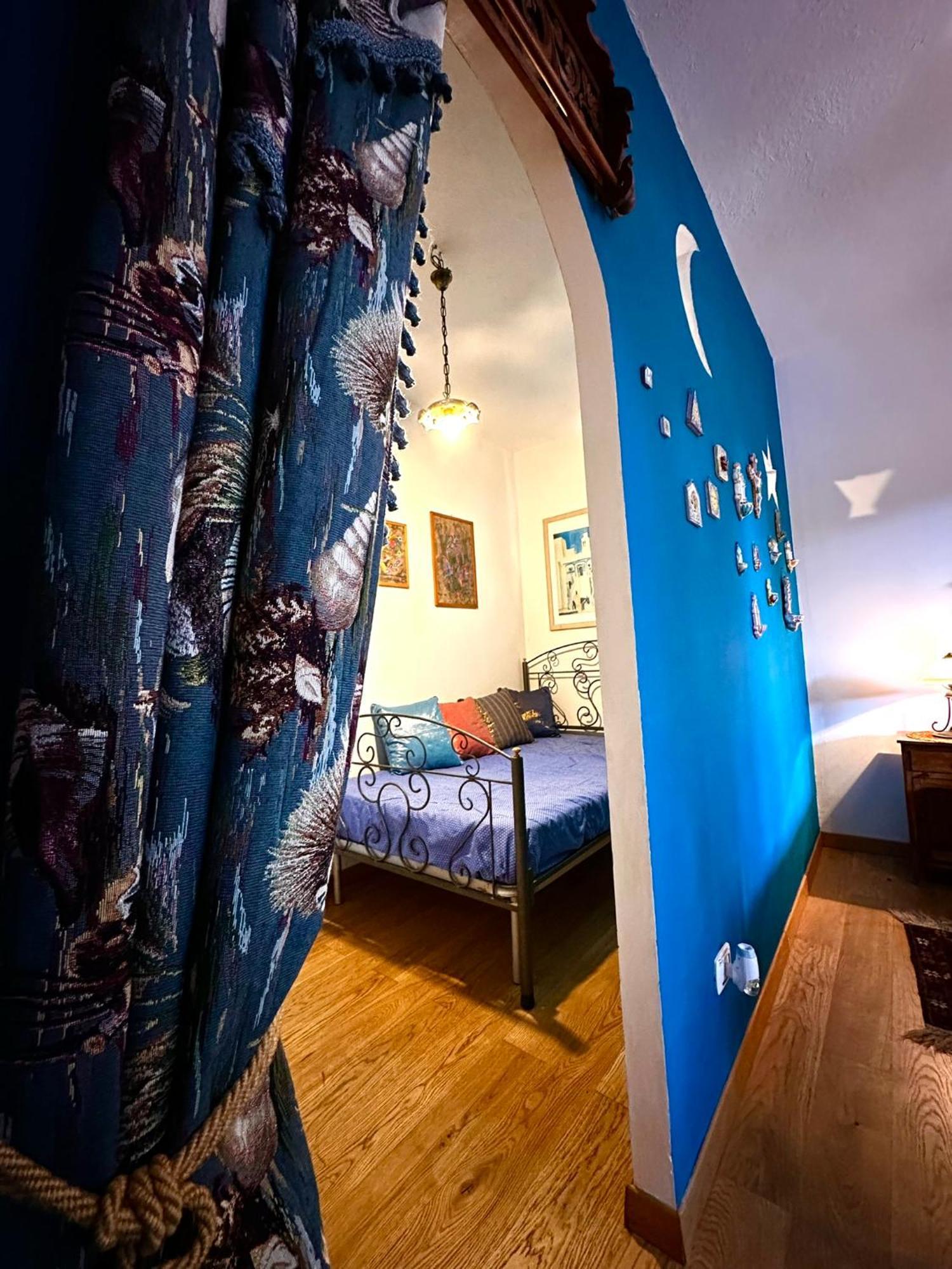 Casa Perciata - Locazione Turistica Apartment Мондело Екстериор снимка