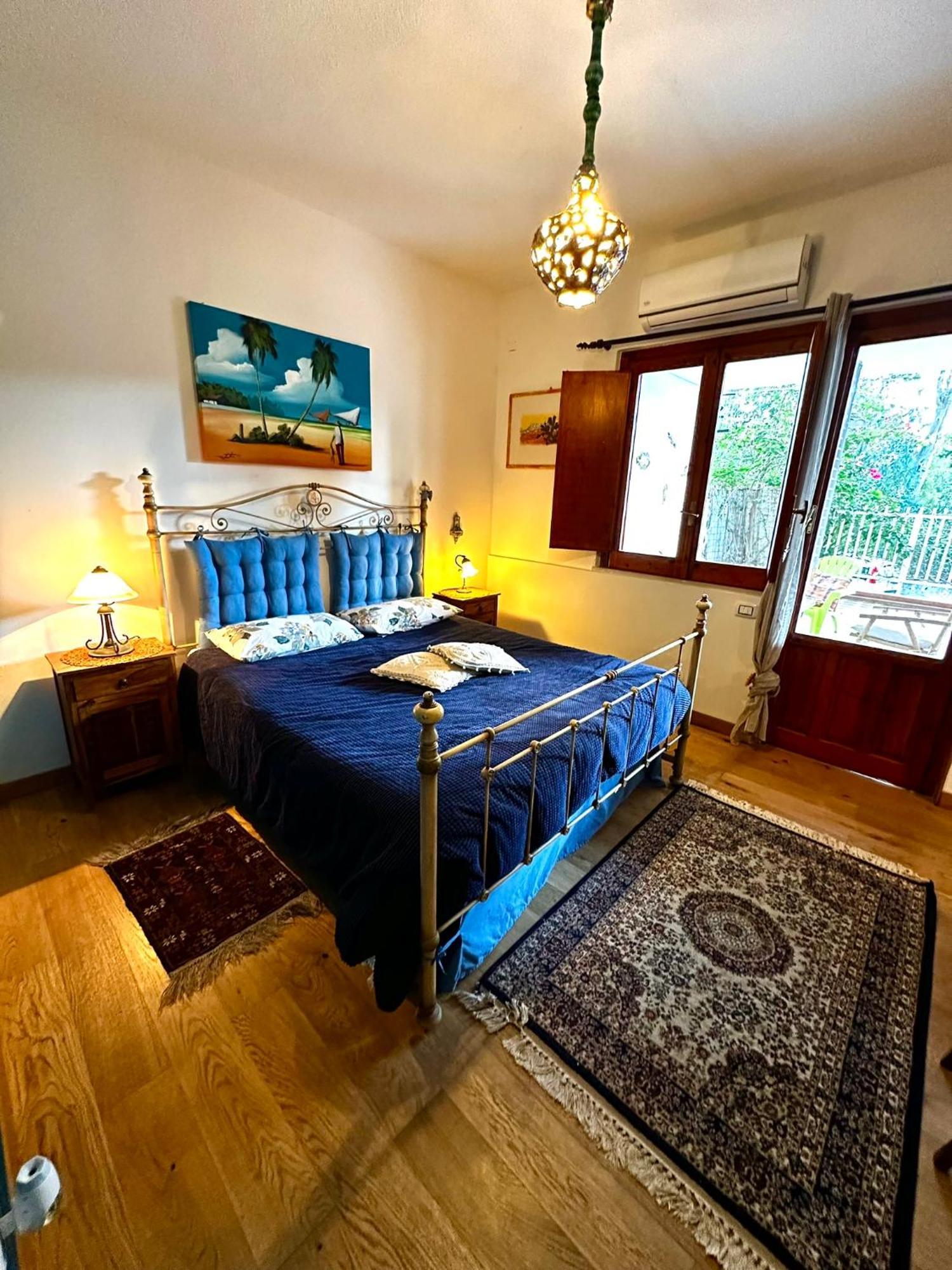 Casa Perciata - Locazione Turistica Apartment Мондело Екстериор снимка