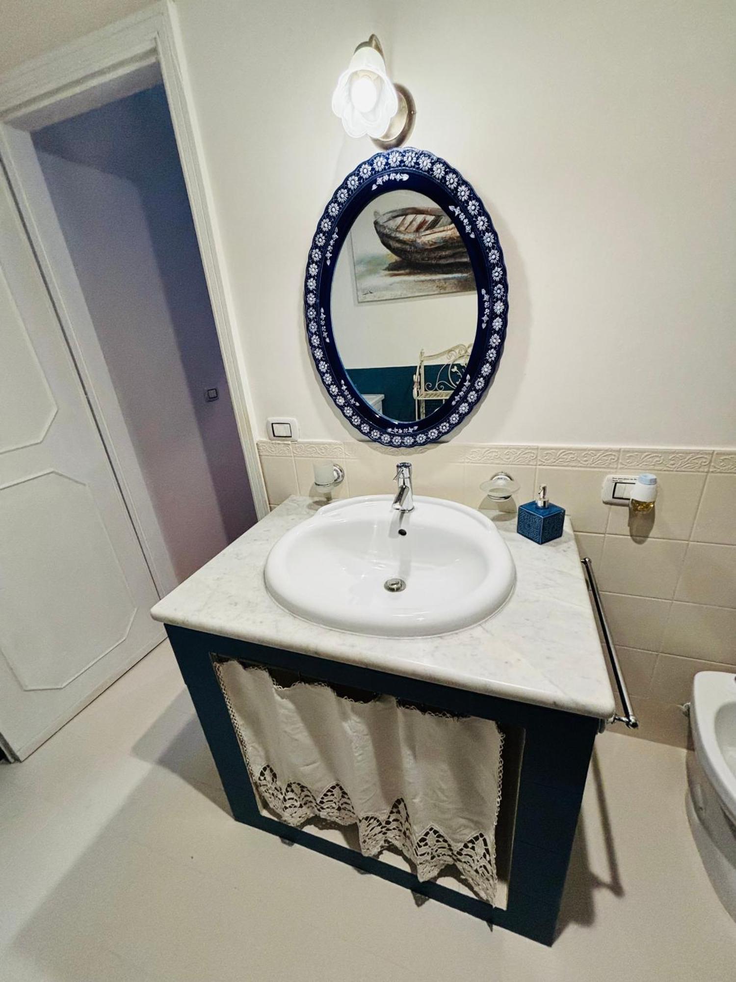Casa Perciata - Locazione Turistica Apartment Мондело Екстериор снимка